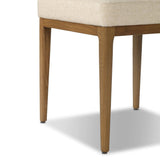 The classic material mix look you want in your dining space. Butterscotch top-grain leather with a subtle vintage look pairs with a neutral performance fabric-upholstered seat. Tapered legs and an armless silhouette look timelessly chic. Amethyst Home provides interior design, new home construction design consulting, vintage area rugs, and lighting in the San Diego metro area.