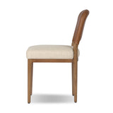 The classic material mix look you want in your dining space. Butterscotch top-grain leather with a subtle vintage look pairs with a neutral performance fabric-upholstered seat. Tapered legs and an armless silhouette look timelessly chic. Amethyst Home provides interior design, new home construction design consulting, vintage area rugs, and lighting in the Seattle metro area.