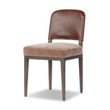 A moody, mixed material look that stands out. A velvety, wool-blend seat and top-grain leather, seat back are framed by solid