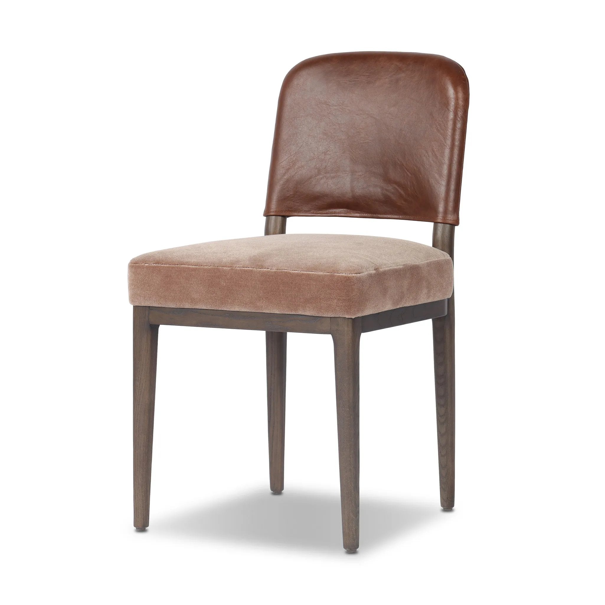 A moody, mixed material look that stands out. A velvety, wool-blend seat and top-grain leather, seat back are framed by solid