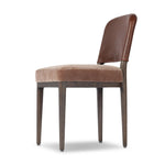 A moody, mixed material look that stands out. A velvety, wool-blend seat and top-grain leather, seat back are framed by solid