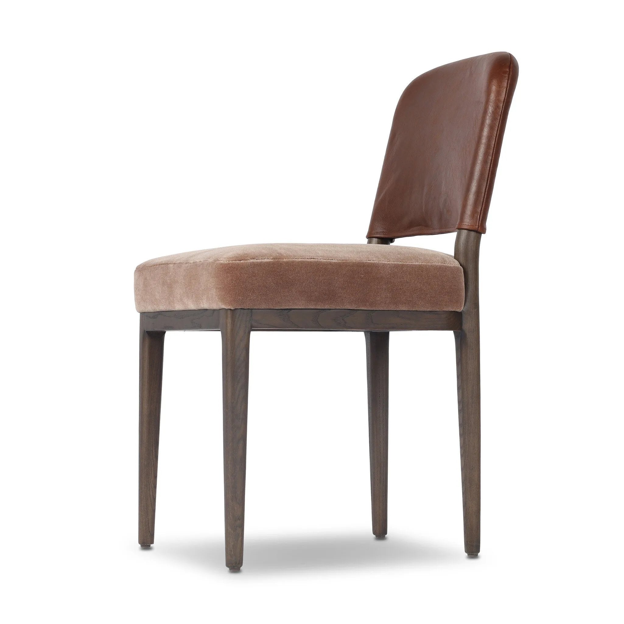 A moody, mixed material look that stands out. A velvety, wool-blend seat and top-grain leather, seat back are framed by solid