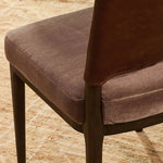 A moody, mixed material look that stands out. A velvety, wool-blend seat and top-grain leather, seat back are framed by solid