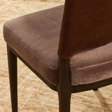 A moody, mixed material look that stands out. A velvety, wool-blend seat and top-grain leather, seat back are framed by solid