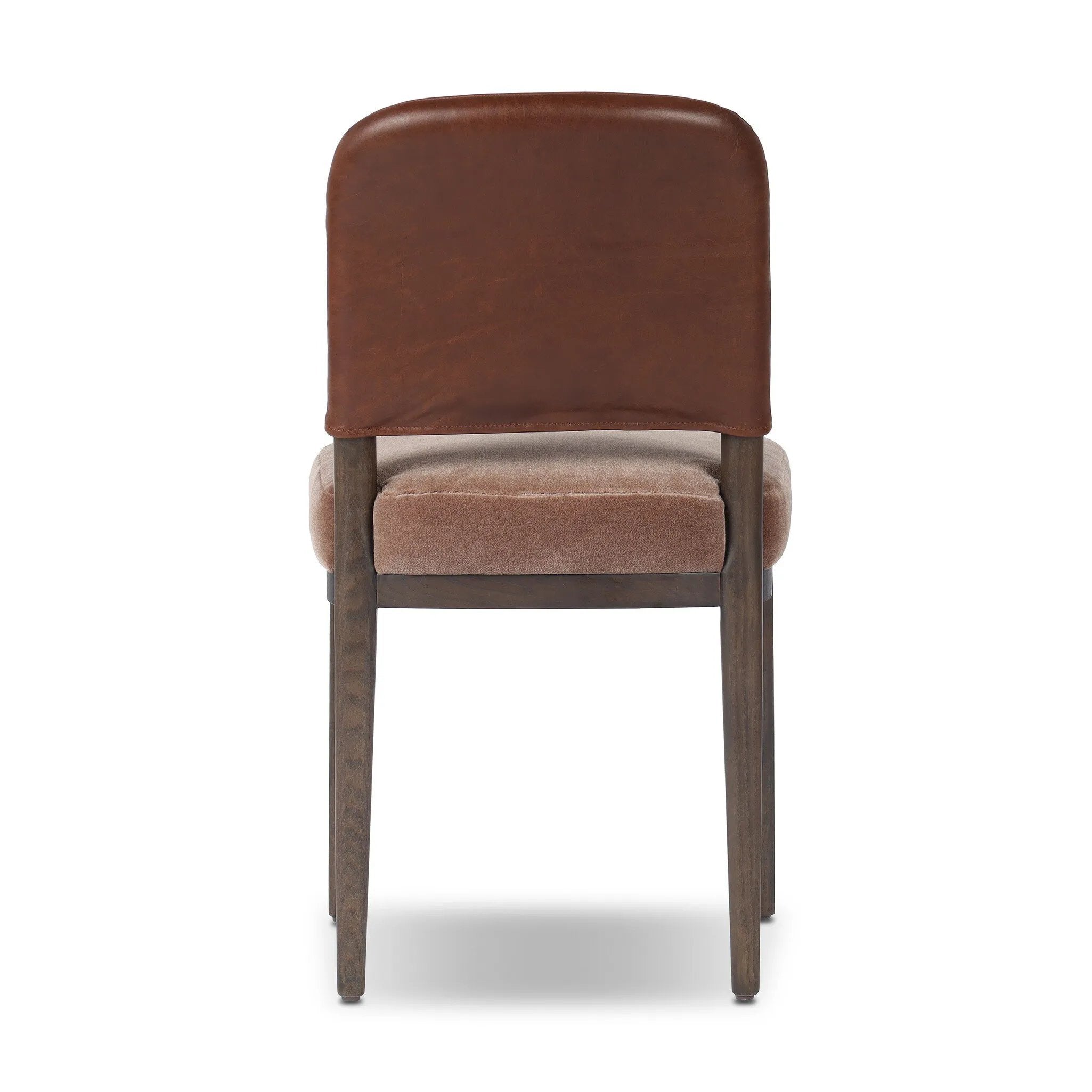 A moody, mixed material look that stands out. A velvety, wool-blend seat and top-grain leather, seat back are framed by solid
