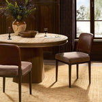A moody, mixed material look that stands out. A velvety, wool-blend seat and top-grain leather, seat back are framed by solid