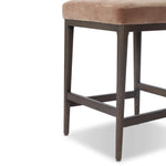 A moody, mixed material stool that stands out. A velvety, wool-blend seat and top-grain leather, seat back are framed by solid ash. Perfectly sized for the counter.As fans of organic modern aesthetics at Amethyst, we love the designer inspired Ryver Stool. Amethyst Home provides interior design, new home construction design consulting, vintage area rugs, and lighting in the Dallas metro area.