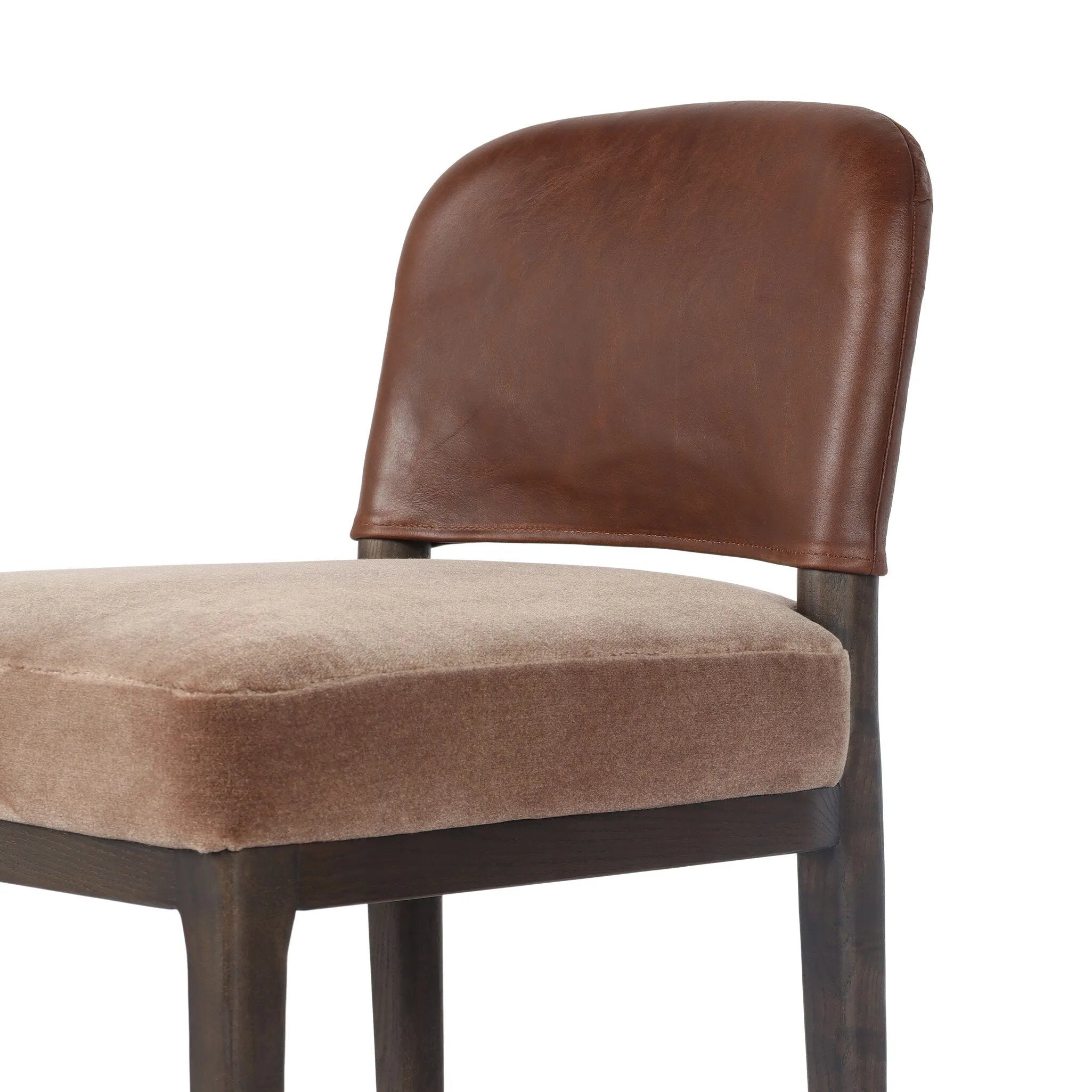 A moody, mixed material stool that stands out. A velvety, wool-blend seat and top-grain leather, seat back are framed by solid ash. Perfectly sized for the counter.As fans of organic modern aesthetics at Amethyst, we love the designer inspired Ryver Stool. Amethyst Home provides interior design, new home construction design consulting, vintage area rugs, and lighting in the Salt Lake City metro area.