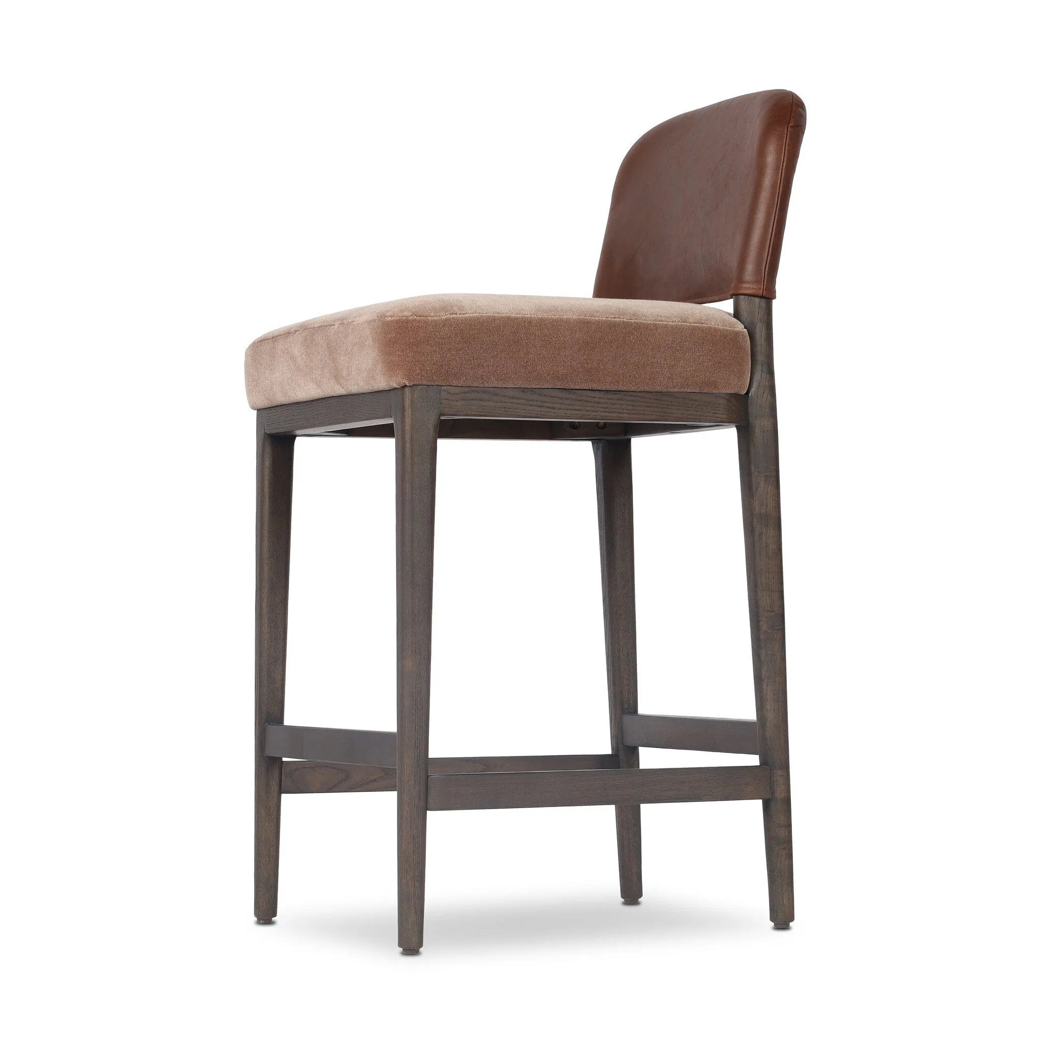 A moody, mixed material stool that stands out. A velvety, wool-blend seat and top-grain leather, seat back are framed by solid ash. Perfectly sized for the counter.As fans of organic modern aesthetics at Amethyst, we love the designer inspired Ryver Stool. Amethyst Home provides interior design, new home construction design consulting, vintage area rugs, and lighting in the Seattle metro area.