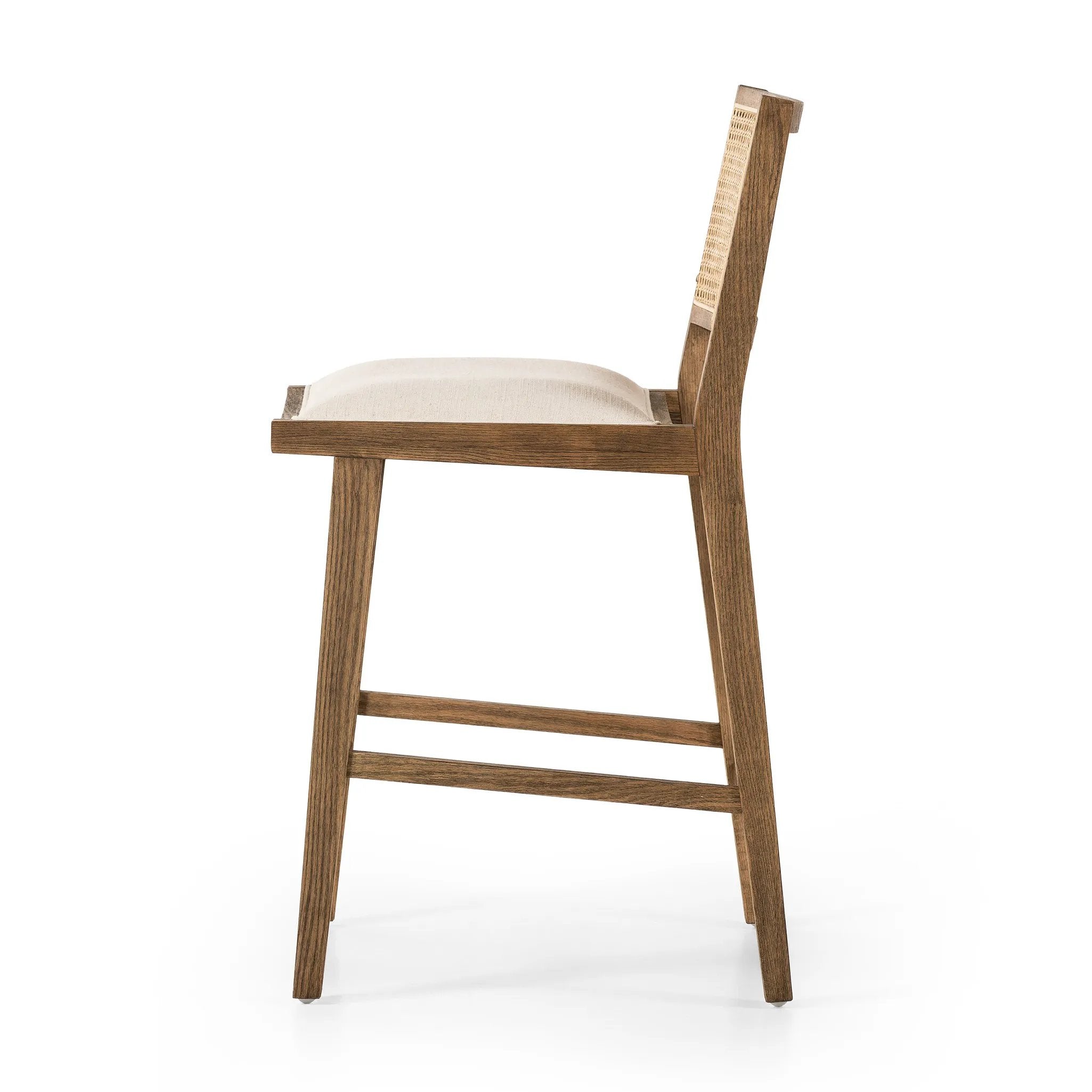 Featuring Sage Savile Flax Bar + Counter Stool by Four Hands at Amethyst Home. Mixed materials make the chair. Solid natural beech wood features a natural cane back for extra texture, while a butterscotch-finished faux leather seat serves total comfort.BarOverall Dimensions: 20.50"w x 23.00"d x 42.50"hWeight: 22.05 lbsCounterOverall Dimensions: 20.50"w x 23. Amethyst Home provides interior design, new home construction design consulting, vintage area rugs, and lighting in the Charlotte metro area.