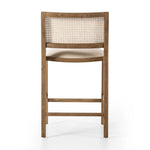 Featuring Sage Savile Flax Bar + Counter Stool by Four Hands at Amethyst Home. Mixed materials make the chair. Solid natural beech wood features a natural cane back for extra texture, while a butterscotch-finished faux leather seat serves total comfort.BarOverall Dimensions: 20.50"w x 23.00"d x 42.50"hWeight: 22.05 lbsCounterOverall Dimensions: 20.50"w x 23.0. Amethyst Home provides interior design, new home construction design consulting, vintage area rugs, and lighting in the Seattle metro area.