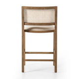 Featuring Sage Savile Flax Bar + Counter Stool by Four Hands at Amethyst Home. Mixed materials make the chair. Solid natural beech wood features a natural cane back for extra texture, while a butterscotch-finished faux leather seat serves total comfort.BarOverall Dimensions: 20.50"w x 23.00"d x 42.50"hWeight: 22.05 lbsCounterOverall Dimensions: 20.50"w x 23.0. Amethyst Home provides interior design, new home construction design consulting, vintage area rugs, and lighting in the Seattle metro area.