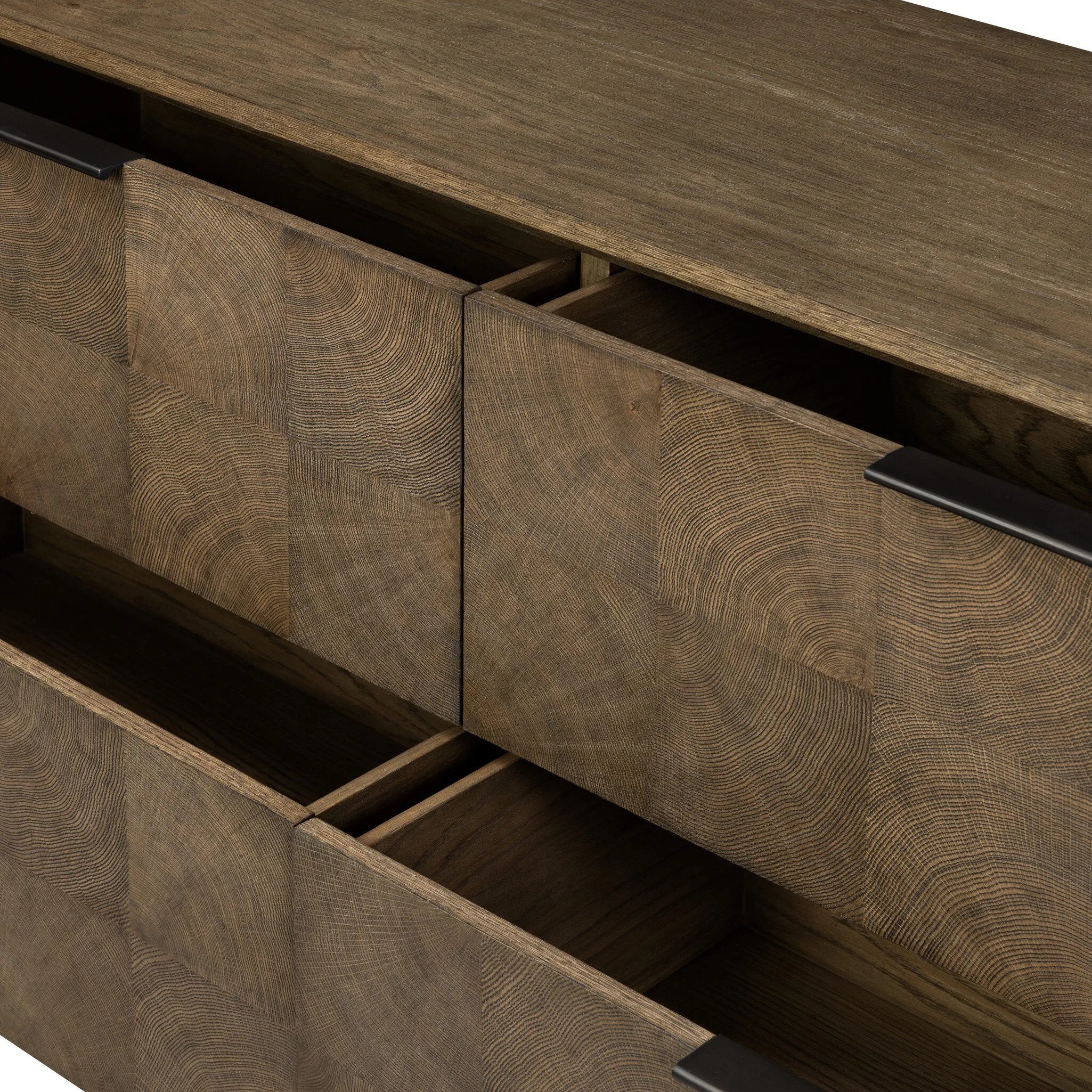 Influenced by contemporary design, this dresser’s simple frame showcases thick brown oak veneer with a tiled oyster cut pattern on the insert panels. Store your favorite clothing in four drawers with minimalist metal pulls.As fans of clean aesthetics at Amethyst, we love the nature inspired Salta 4 Drawer Dresser - Brown Oak Thin Oyster. Amethyst Home provides interior design, new home construction design consulting, vintage area rugs, and lighting in the Houston metro area.