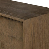 Grounding and stunning. We paired a modern frame and chunky base with door panels featuring oyster cuts of oak that take a specialized skill to create. Each cut captures the story of the wood and brings a natural, organic rhythm to the entire cabinet, and any space. Amethyst Home provides interior design, new home construction design consulting, vintage area rugs, and lighting in the Calabasas metro area.
