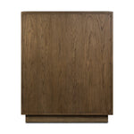 Grounding and stunning. We paired a modern frame and chunky base with door panels featuring oyster cuts of oak that take a specialized skill to create. Each cut captures the story of the wood and brings a natural, organic rhythm to the entire cabinet, and any space. Amethyst Home provides interior design, new home construction design consulting, vintage area rugs, and lighting in the Dallas metro area.