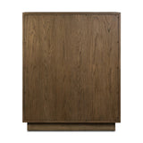 Grounding and stunning. We paired a modern frame and chunky base with door panels featuring oyster cuts of oak that take a specialized skill to create. Each cut captures the story of the wood and brings a natural, organic rhythm to the entire cabinet, and any space. Amethyst Home provides interior design, new home construction design consulting, vintage area rugs, and lighting in the Dallas metro area.