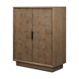 Grounding and stunning. We paired a modern frame and chunky base with door panels featuring oyster cuts of oak that take a specialized skill to create. Each cut captures the story of the wood and brings a natural, organic rhythm to the entire cabinet, and any space. Amethyst Home provides interior design, new home construction design consulting, vintage area rugs, and lighting in the Portland metro area.