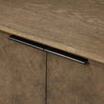 This media console’s simple frame showcases thick brown oak veneer with an oyster cut grid pattern on the door and drawer fronts. Minimalist metal pulls open to ample storage for living space essentials. Rear cutouts for cord management.As lovers of luxe style at Amethyst, we love the designer inspired Salta Media Console - Brown Oak Thick Veneer. Amethyst Home provides interior design, new home construction design consulting, vintage area rugs, and lighting in the Laguna Beach metro area.