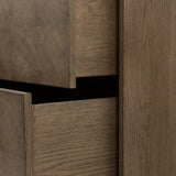 This media console’s simple frame showcases thick brown oak veneer with an oyster cut grid pattern on the door and drawer fronts. Minimalist metal pulls open to ample storage for living space essentials. Rear cutouts for cord management.As lovers of luxe style at Amethyst, we love the designer inspired Salta Media Console - Brown Oak Thick Veneer. Amethyst Home provides interior design, new home construction design consulting, vintage area rugs, and lighting in the Monterey metro area.