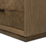 Influenced by contemporary design, this nightstand’s simple frame showcases thick brown oak veneer with a tiled oyster cut pattern on the insert panels. Three drawers with minimalist metal pulls offer ample space for bedside essentials. Amethyst Home provides interior design, new home construction design consulting, vintage area rugs, and lighting in the Houston metro area.