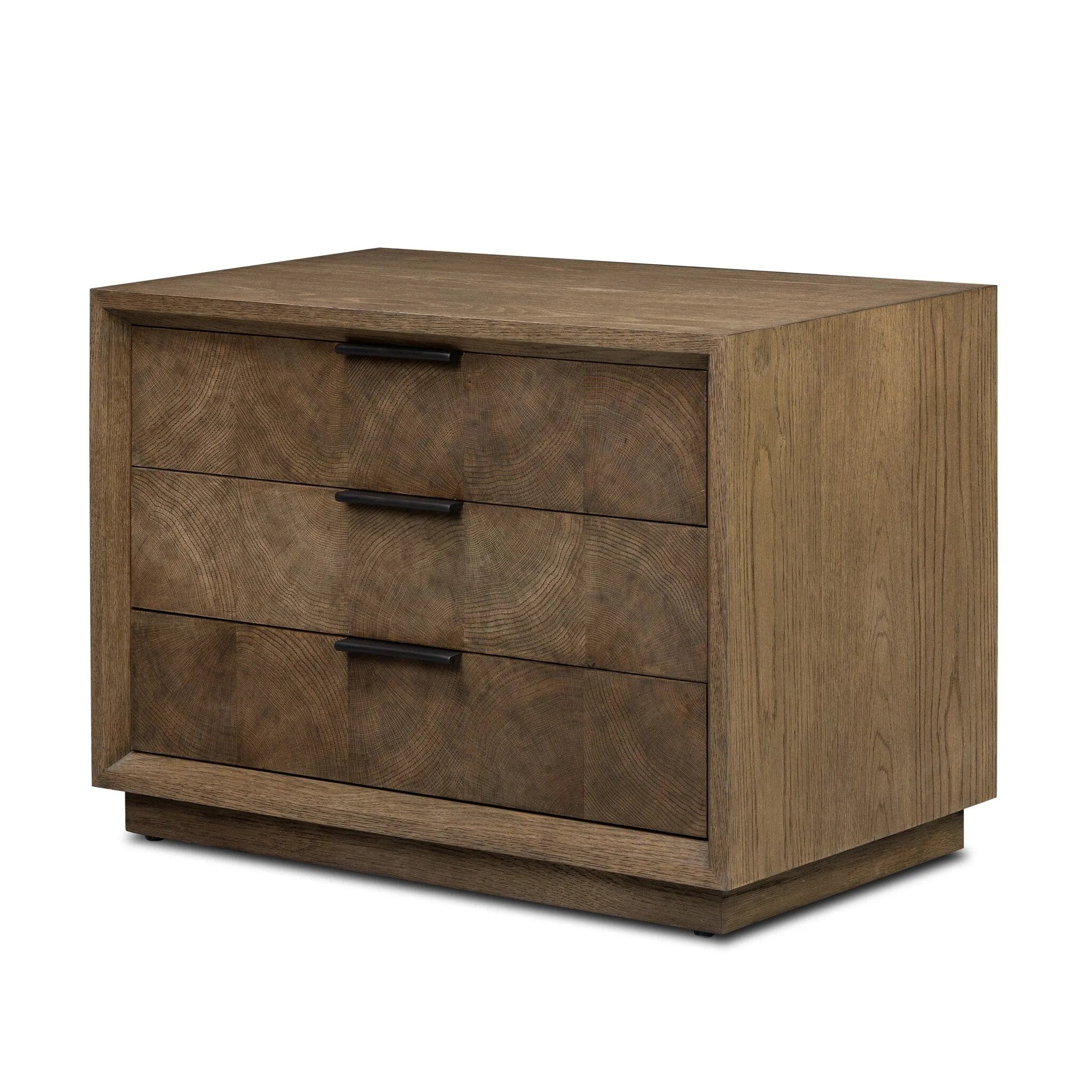 Influenced by contemporary design, this nightstand’s simple frame showcases thick brown oak veneer with a tiled oyster cut pattern on the insert panels. Three drawers with minimalist metal pulls offer ample space for bedside essentials. Amethyst Home provides interior design, new home construction design consulting, vintage area rugs, and lighting in the Omaha metro area.