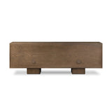 Grounding and stunning. We paired a modern frame and chunky base with door panels featuring oyster cuts of oak that take a specialized skill to create. Each cut captures the story of the wood and brings a natural, organic rhythm to the entire sideboard, and any space. Amethyst Home provides interior design, new home construction design consulting, vintage area rugs, and lighting in the Calabasas metro area.