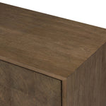 Grounding and stunning. We paired a modern frame and chunky base with door panels featuring oyster cuts of oak that take a specialized skill to create. Each cut captures the story of the wood and brings a natural, organic rhythm to the entire sideboard, and any space. Amethyst Home provides interior design, new home construction design consulting, vintage area rugs, and lighting in the Charlotte metro area.