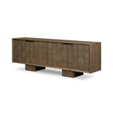 Grounding and stunning. We paired a modern frame and chunky base with door panels featuring oyster cuts of oak that take a specialized skill to create. Each cut captures the story of the wood and brings a natural, organic rhythm to the entire sideboard, and any space. Amethyst Home provides interior design, new home construction design consulting, vintage area rugs, and lighting in the Houston metro area.