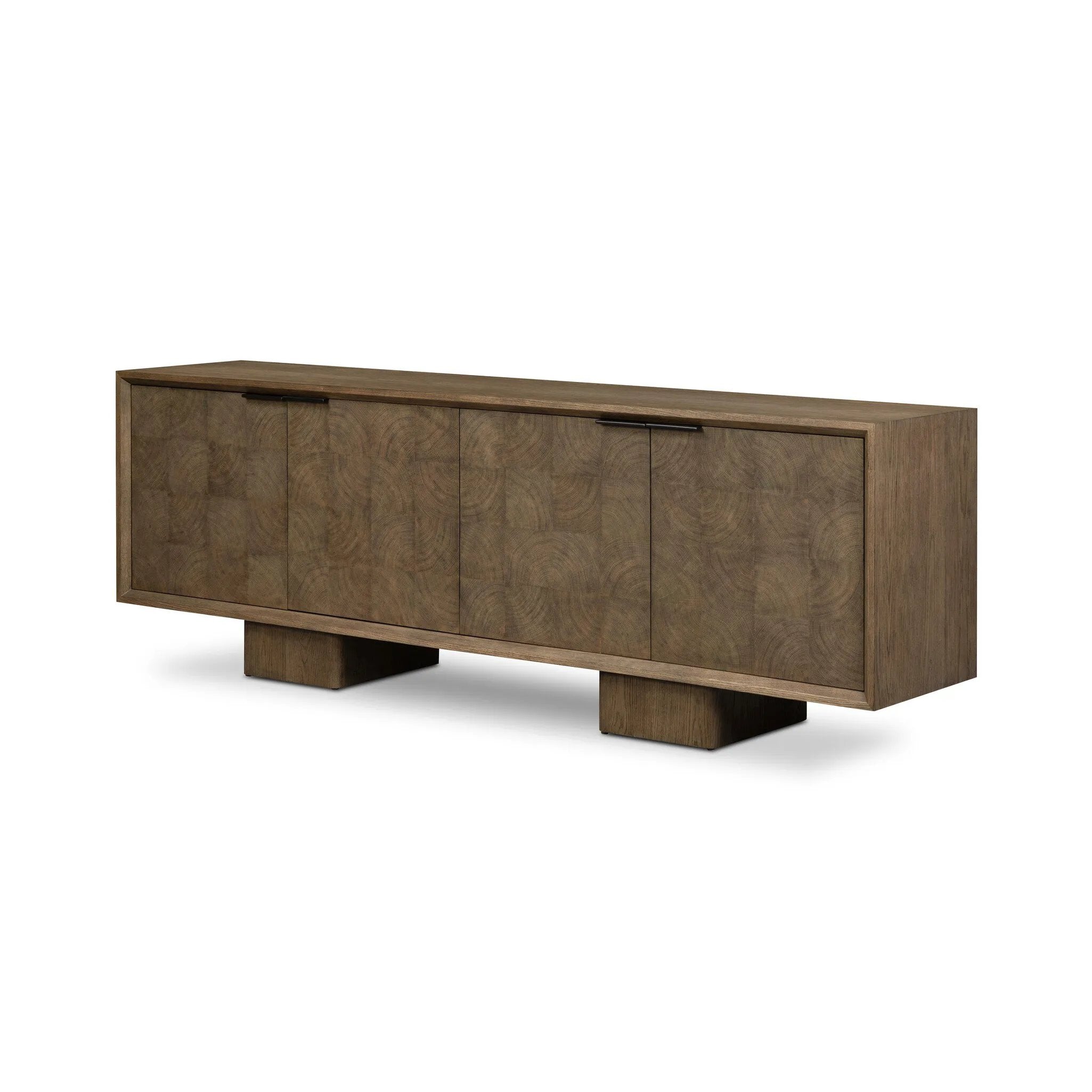Grounding and stunning. We paired a modern frame and chunky base with door panels featuring oyster cuts of oak that take a specialized skill to create. Each cut captures the story of the wood and brings a natural, organic rhythm to the entire sideboard, and any space. Amethyst Home provides interior design, new home construction design consulting, vintage area rugs, and lighting in the Houston metro area.