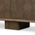 Grounding and stunning. We paired a modern frame and chunky base with door panels featuring oyster cuts of oak that take a specialized skill to create. Each cut captures the story of the wood and brings a natural, organic rhythm to the entire sideboard, and any space. Amethyst Home provides interior design, new home construction design consulting, vintage area rugs, and lighting in the Winter Garden metro area.