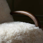 Featuring Sandro Champagne Mongolian Fur Chair by Four Hands at Amethyst Home. This versatile accent chair is upholstered in a faux Mongolian shearling with a textural high pile. A contrasting, chunky parawood frame hugs the seat and is wire-brushed for a warm, vintage feel. Overall Dimensions: 29.50"w x 42.25"d x 32.50"h
Discover this on social media? See mor. Amethyst Home provides interior design, new home construction design consulting, vintage area rugs, and lighting in the Dallas metro area.