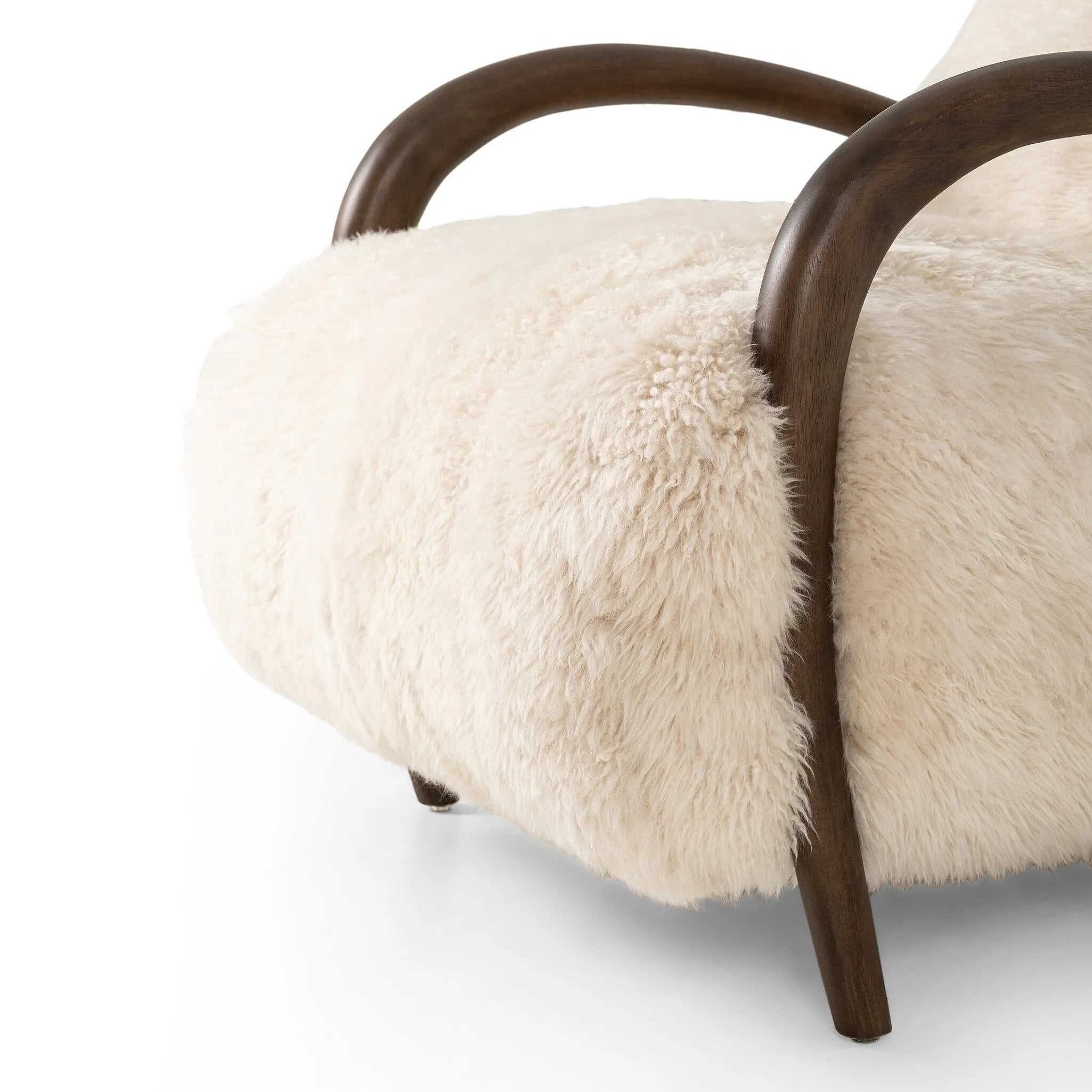 Featuring Sandro Champagne Mongolian Fur Chair by Four Hands at Amethyst Home. This versatile accent chair is upholstered in a faux Mongolian shearling with a textural high pile. A contrasting, chunky parawood frame hugs the seat and is wire-brushed for a warm, vintage feel. Overall Dimensions: 29.50"w x 42.25"d x 32.50"h
Discover this on social media? . Amethyst Home provides interior design, new home construction design consulting, vintage area rugs, and lighting in the Newport Beach metro area.