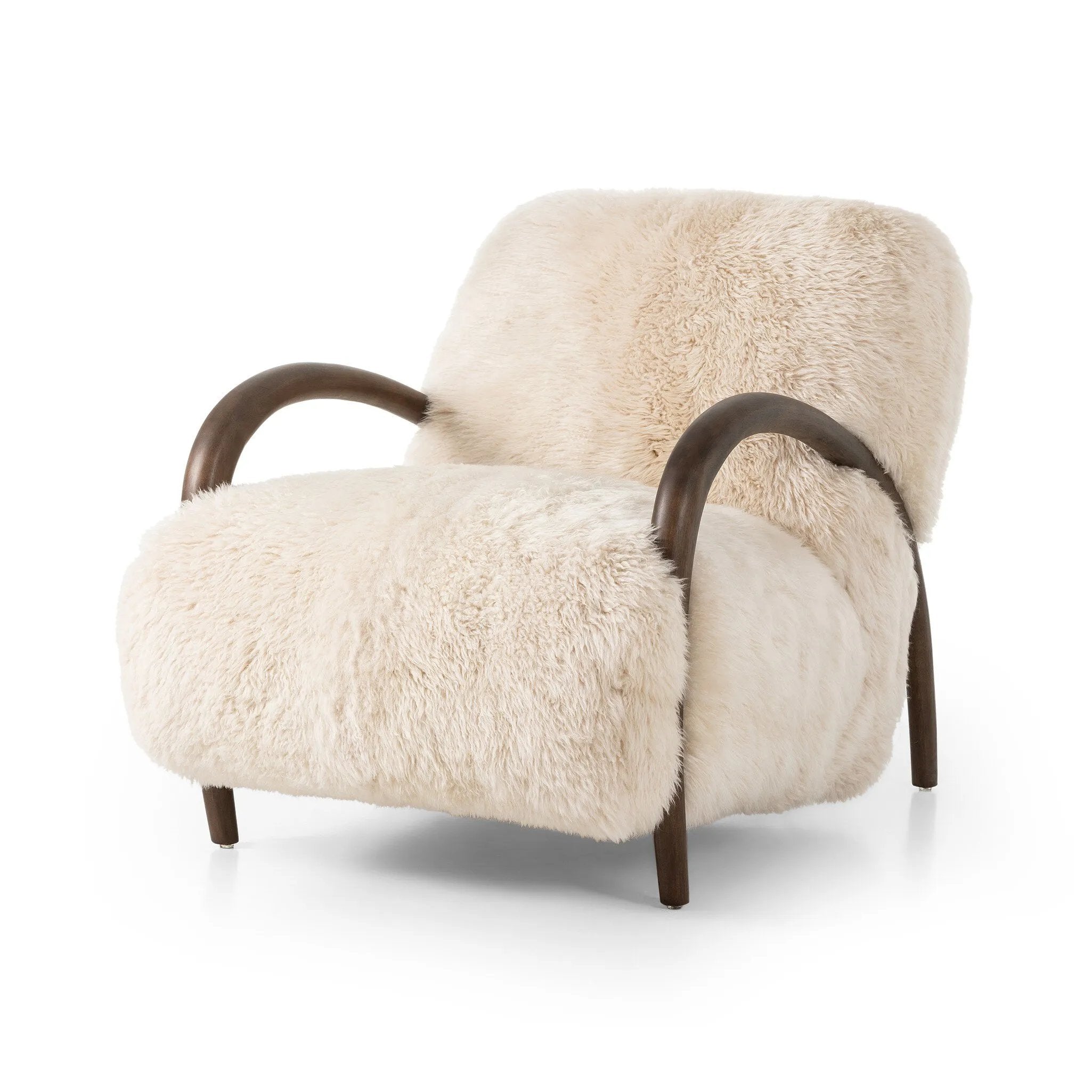 Featuring Sandro Champagne Mongolian Fur Chair by Four Hands at Amethyst Home. This versatile accent chair is upholstered in a faux Mongolian shearling with a textural high pile. A contrasting, chunky parawood frame hugs the seat and is wire-brushed for a warm, vintage feel. Overall Dimensions: 29.50"w x 42.25"d x 32.50"h
Discover this on social media? See. Amethyst Home provides interior design, new home construction design consulting, vintage area rugs, and lighting in the Washington metro area.