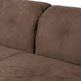 Inspired by 1970s Brutalism, this urban tuxedo sofa balances a rounded solid wood plinth with a curved seat deck and a relaxed, "wrinkled" upholstery design. Feather-blend cushions wrap the frame, finished with dramatic blind tufting for a hand-crafted, textural edge. Amethyst Home provides interior design, new home construction design consulting, vintage area rugs, and lighting in the Dallas metro area.