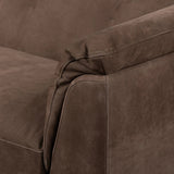 Inspired by 1970s Brutalism, this urban tuxedo sofa balances a rounded solid wood plinth with a curved seat deck and a relaxed, "wrinkled" upholstery design. Feather-blend cushions wrap the frame, finished with dramatic blind tufting for a hand-crafted, textural edge. Amethyst Home provides interior design, new home construction design consulting, vintage area rugs, and lighting in the Winter Garden metro area.