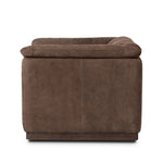 Inspired by 1970s brutalism, this urban swivel chair balances a rounded solid wood plinth with a curved seat deck and a relaxed, "wrinkled" upholstery design. Feather-blend cushions wrap the frame, finished with dramatic blind tufting for a hand-crafted, textural edge. Amethyst Home provides interior design, new home construction design consulting, vintage area rugs, and lighting in the Laguna Beach metro area.