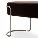 Modern vibes, playful shaping. Velvety, cocoa-colored performance fabric pairs with a silver-finished stainless steel frame. Performance fabrics are specially created to withstand spills, stains, high traffic and wear, ensuring long-term comfort and unmatched durability. Amethyst Home provides interior design, new home construction design consulting, vintage area rugs, and lighting in the Seattle metro area.