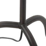 Featuring Selby Black Wrought Iron Floor Lamp by Four Hands at Amethyst Home. A curved cast iron tripod base pairs with an elongated boucle shade for a sculpted, minimalist look that works into any room with ease. Overall Dimensions: 12.75"w x 12.75"d x 60.00"h. Amethyst Home provides interior design, new home construction design consulting, vintage area rugs, and lighting in the Kansas City metro area.