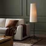 Featuring Selby Black Wrought Iron Floor Lamp by Four Hands at Amethyst Home. A curved cast iron tripod base pairs with an elongated boucle shade for a sculpted, minimalist look that works into any room with ease. Overall Dimensions: 12.75"w x 12.75"d x 60.00"h. Amethyst Home provides interior design, new home construction design consulting, vintage area rugs, and lighting in the Nashville metro area.