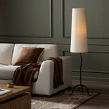 Featuring Selby Black Wrought Iron Floor Lamp by Four Hands at Amethyst Home. A curved cast iron tripod base pairs with an elongated boucle shade for a sculpted, minimalist look that works into any room with ease. Overall Dimensions: 12.75"w x 12.75"d x 60.00"h. Amethyst Home provides interior design, new home construction design consulting, vintage area rugs, and lighting in the Nashville metro area.