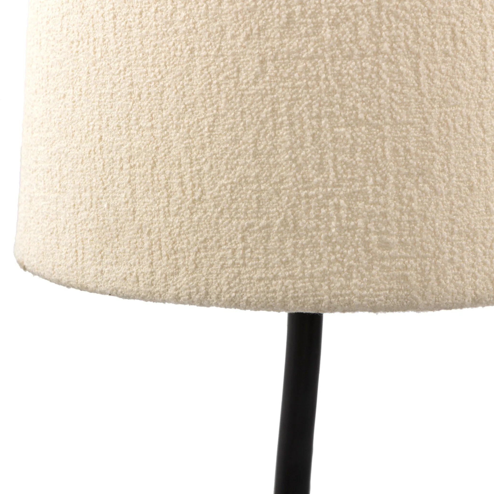 Featuring Selby Black Wrought Iron Floor Lamp by Four Hands at Amethyst Home. A curved cast iron tripod base pairs with an elongated boucle shade for a sculpted, minimalist look that works into any room with ease. Overall Dimensions: 12.75"w x 12.75"d x 60.00"h. Amethyst Home provides interior design, new home construction design consulting, vintage area rugs, and lighting in the Scottsdale metro area.