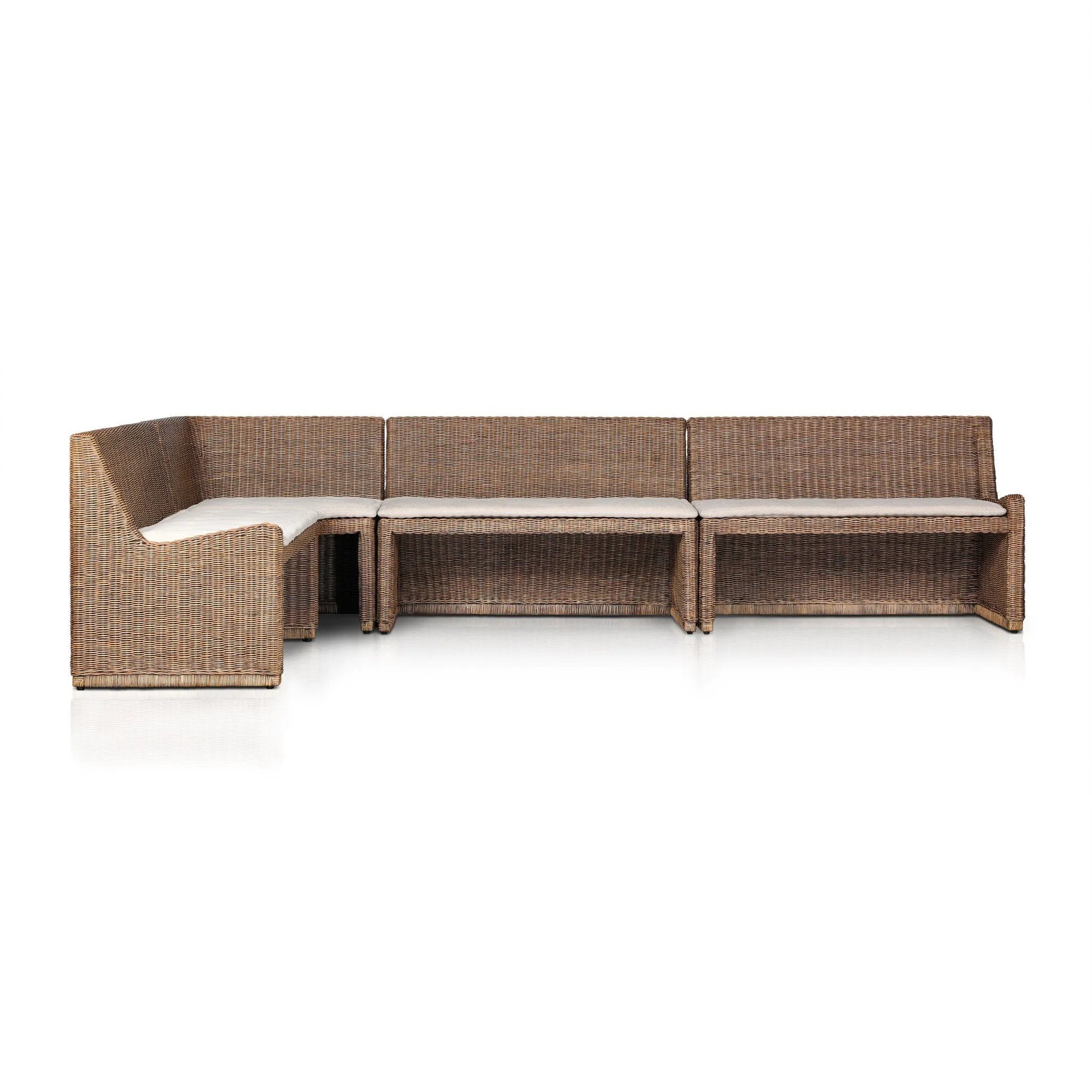 Antique-inspired coastal style. Rattan introduces varying natural shades and texture to this dining bench, and the frame's soft lines and fabric cushion invite a comfortable sit. Option to style alone or pair with other pieces in the collection. A design collaboration by Amber Lewis and Four Hands. Amethyst Home provides interior design, new home construction design consulting, vintage area rugs, and lighting in the Park City metro area.