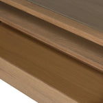 Bring bonus storage and a light look to the living space. Made from sandy oak and clear tempered glass with two roomy drawers on either side of the base, plus shelving beneath the glass that doubles as a shadowbox or an extra display surface.As lovers of luxe design at Amethyst, we love the warm modern inspired Shiloh Coffee Table - Tempered Glass. Amethyst Home provides interior design, new home construction design consulting, vintage area rugs, and lighting in the Los Angeles metro area.