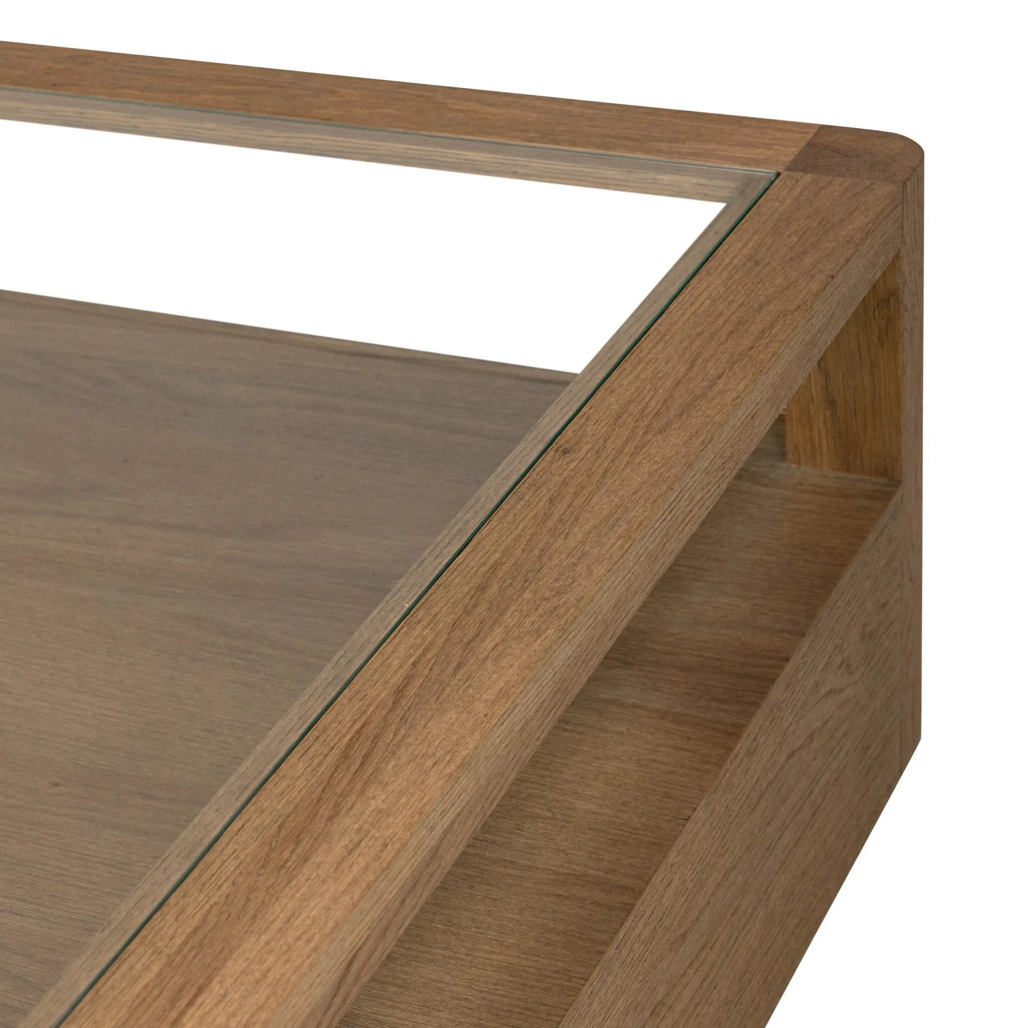 Bring bonus storage and a light look to the living space. Made from sandy oak and clear tempered glass with two roomy drawers on either side of the base, plus shelving beneath the glass that doubles as a shadowbox or an extra display surface.As lovers of luxe design at Amethyst, we love the warm modern inspired Shiloh Coffee Table - Tempered Glass. Amethyst Home provides interior design, new home construction design consulting, vintage area rugs, and lighting in the Miami metro area.