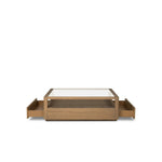 Bring bonus storage and a light look to the living space. Made from sandy oak and clear tempered glass with two roomy drawers on either side of the base, plus shelving beneath the glass that doubles as a shadowbox or an extra display surface.As lovers of luxe design at Amethyst, we love the warm modern inspired Shiloh Coffee Table - Tempered Glass. Amethyst Home provides interior design, new home construction design consulting, vintage area rugs, and lighting in the Newport Beach metro area.
