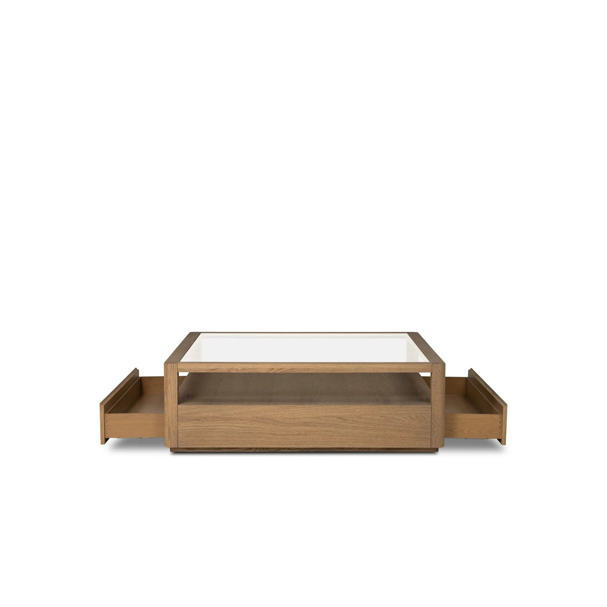 Bring bonus storage and a light look to the living space. Made from sandy oak and clear tempered glass with two roomy drawers on either side of the base, plus shelving beneath the glass that doubles as a shadowbox or an extra display surface.As lovers of luxe design at Amethyst, we love the warm modern inspired Shiloh Coffee Table - Tempered Glass. Amethyst Home provides interior design, new home construction design consulting, vintage area rugs, and lighting in the Newport Beach metro area.