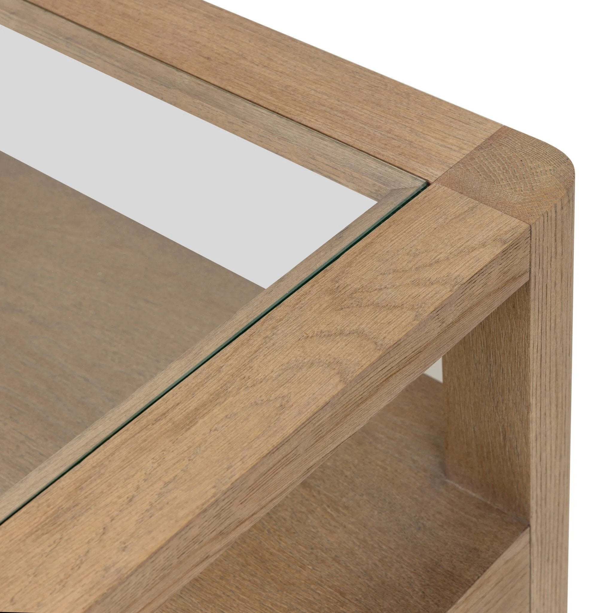 Bring bonus storage and a light look to the living space. Made from sandy oak and clear tempered glass with a single drawer, shelving beneath the glass doubles as a shadowbox or an extra display surface.As lovers of clean materials at Amethyst, we love the designer inspired Shiloh End Table - Tempered Glass. Amethyst Home provides interior design, new home construction design consulting, vintage area rugs, and lighting in the Calabasas metro area.