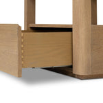 Bring bonus storage and a light look to the living space. Made from sandy oak and clear tempered glass with a single drawer, shelving beneath the glass doubles as a shadowbox or an extra display surface.As lovers of clean materials at Amethyst, we love the designer inspired Shiloh End Table - Tempered Glass. Amethyst Home provides interior design, new home construction design consulting, vintage area rugs, and lighting in the Charlotte metro area.