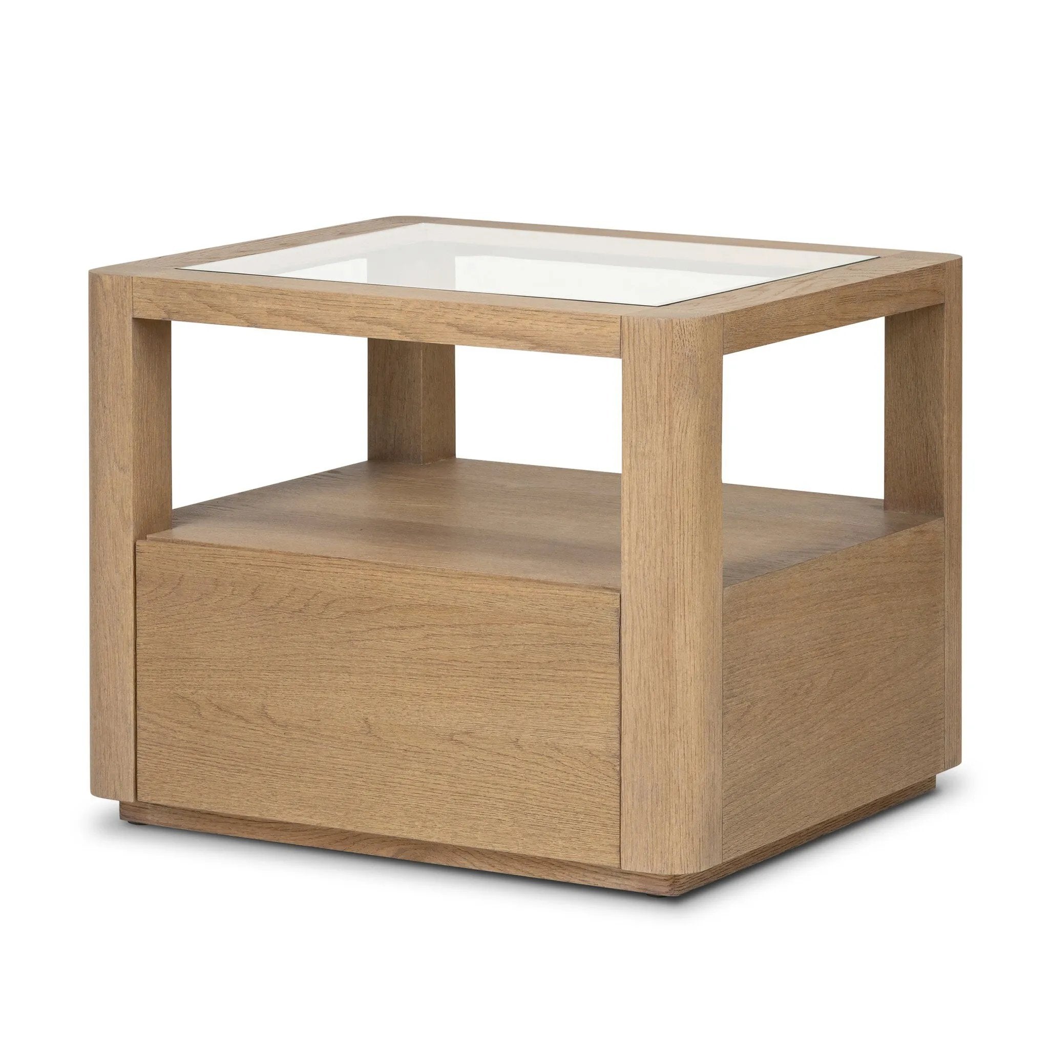 Bring bonus storage and a light look to the living space. Made from sandy oak and clear tempered glass with a single drawer, shelving beneath the glass doubles as a shadowbox or an extra display surface.As lovers of clean materials at Amethyst, we love the designer inspired Shiloh End Table - Tempered Glass. Amethyst Home provides interior design, new home construction design consulting, vintage area rugs, and lighting in the Omaha metro area.