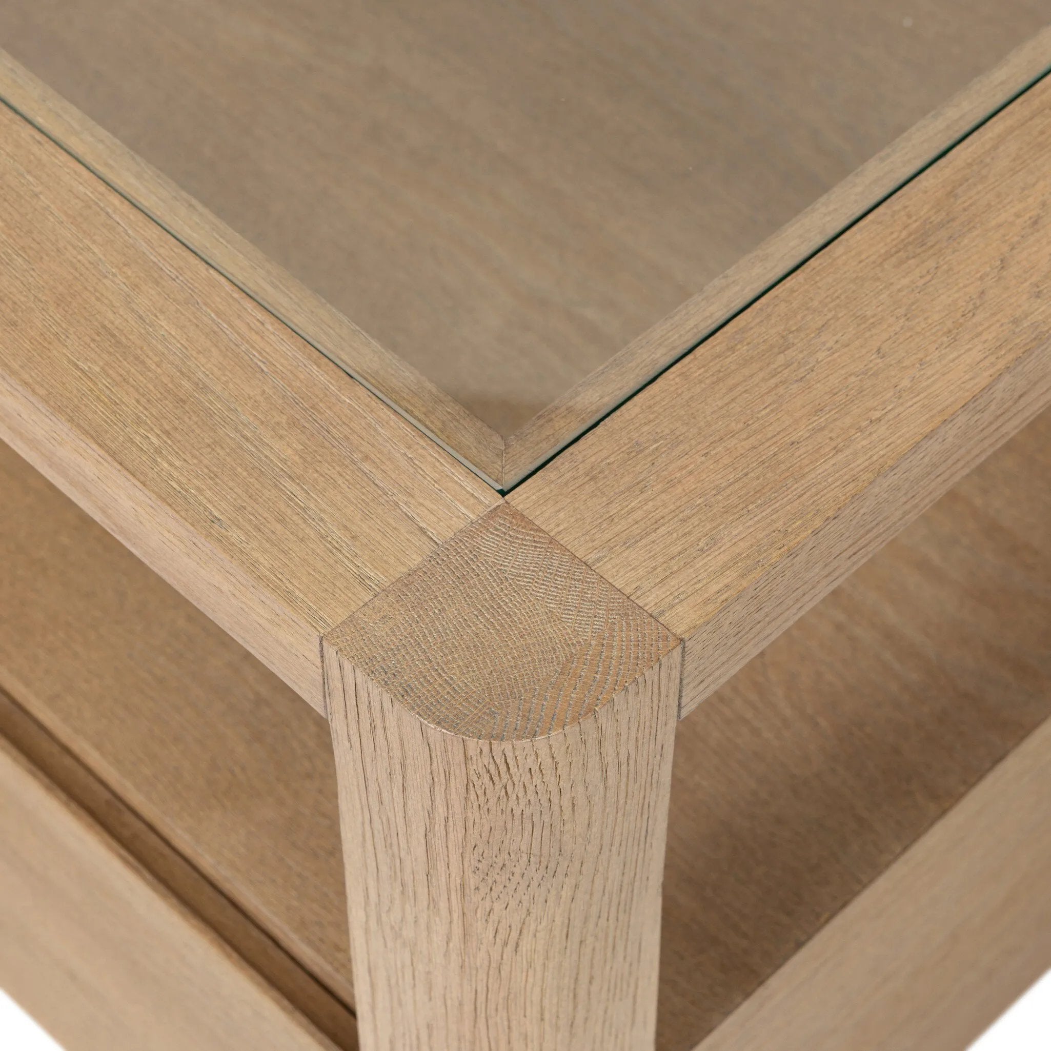 Bring bonus storage and a light look to the living space. Made from sandy oak and clear tempered glass with a single drawer, shelving beneath the glass doubles as a shadowbox or an extra display surface.As lovers of clean materials at Amethyst, we love the designer inspired Shiloh End Table - Tempered Glass. Amethyst Home provides interior design, new home construction design consulting, vintage area rugs, and lighting in the San Diego metro area.